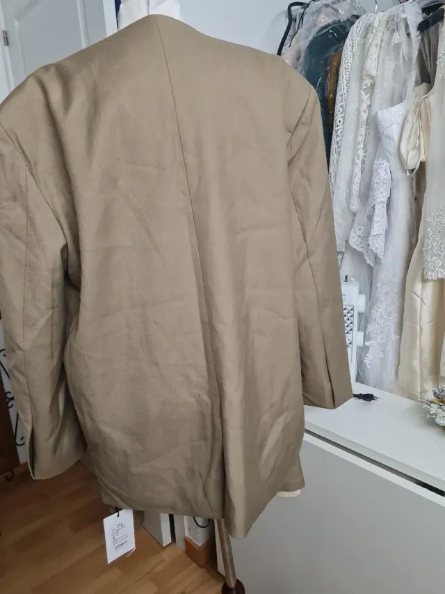 Conjunto sastre dos piezas beige da talla