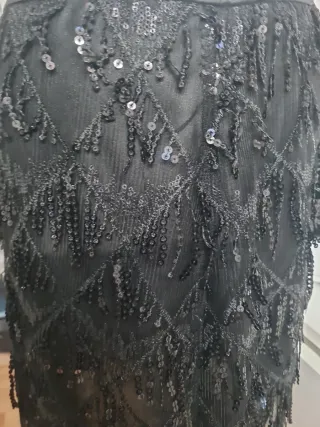 Falda negra lentejuelas flecos