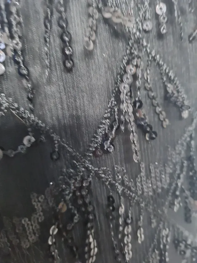 Falda negra lentejuelas flecos