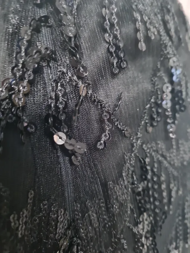 Falda negra lentejuelas flecos