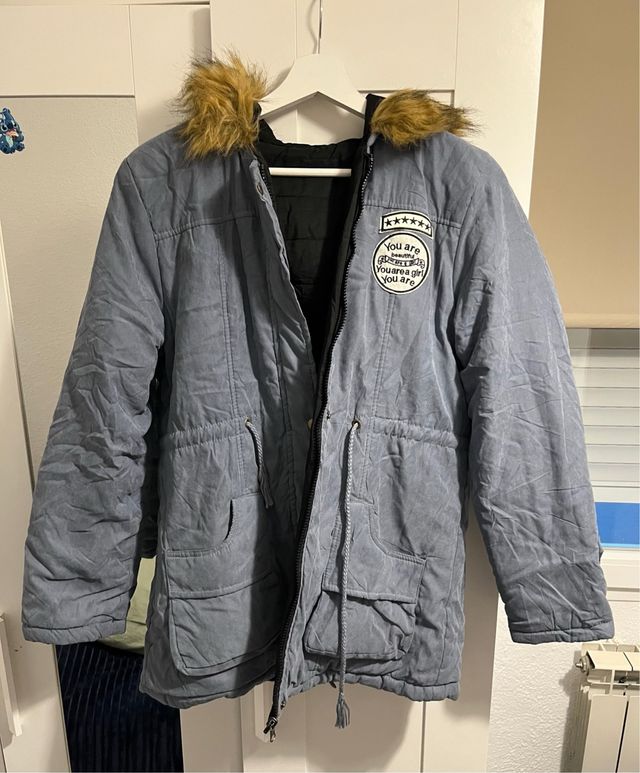 Parka con capucha y pelo