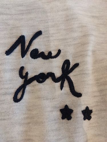 Camiseta gris New York nudo