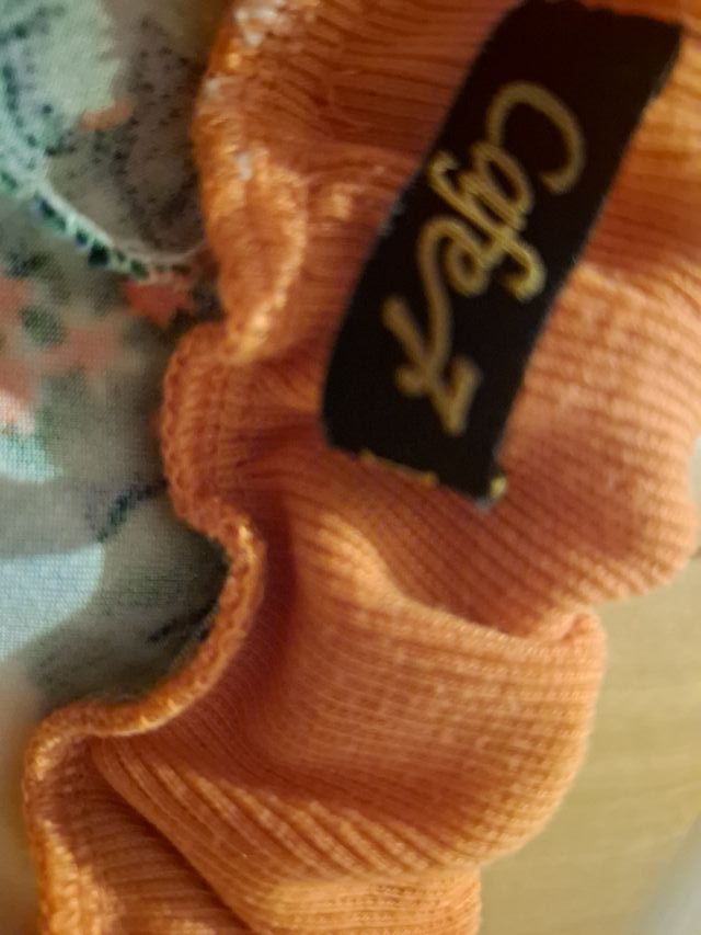 Pantalón corto floral naranja