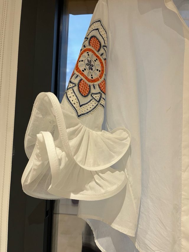 Blusa amplia mujer manga volante