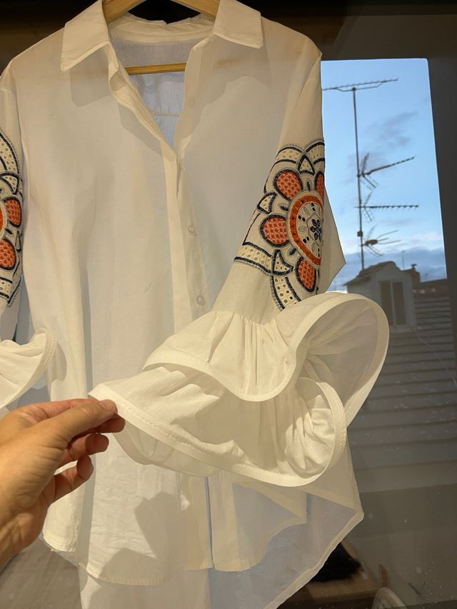 Blusa amplia mujer manga volante