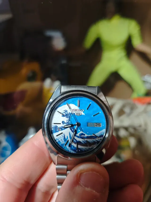 2 relojes un Seiko 5 Automático Pintado y u orient