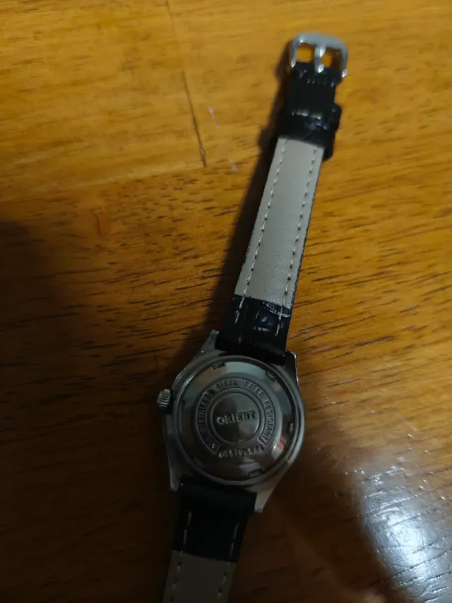 2 relojes un Seiko 5 Automático Pintado y u orient