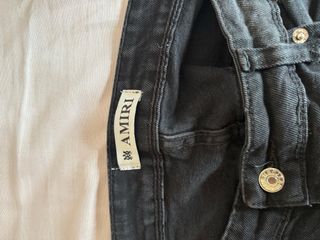 Pantalón vaquero AMIRI negro con manchas