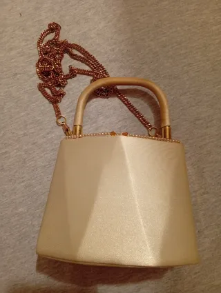 Bolso de fiesta beige y dorado