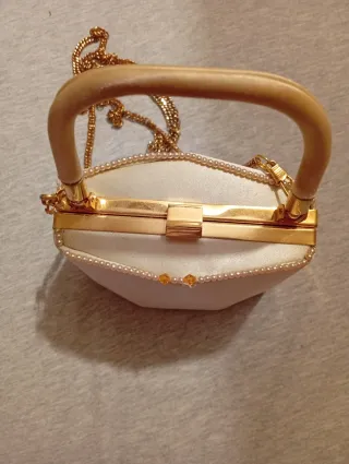 Bolso de fiesta beige y dorado