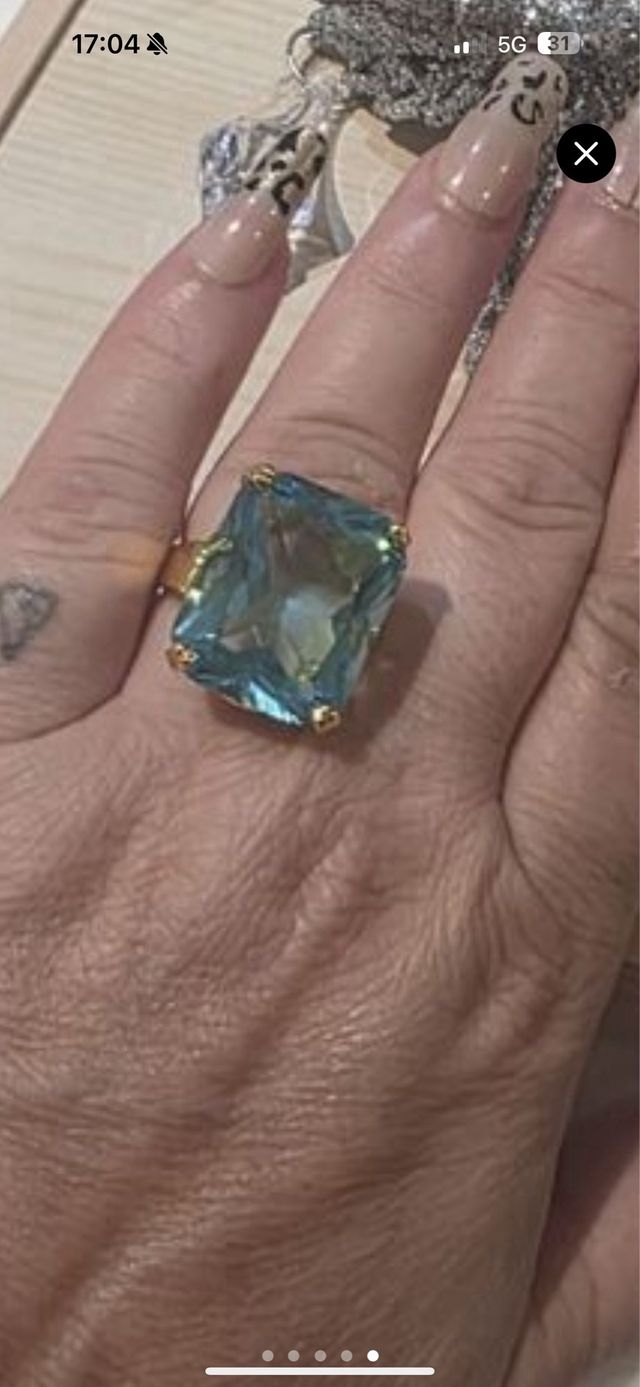 Anillo piedra azul y dorado