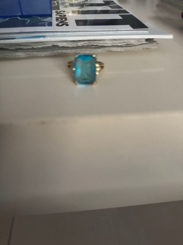 Anillo piedra azul y dorado