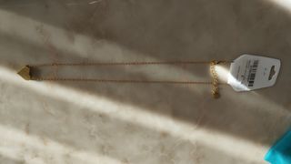 Collana con ciondolo a cuore dorato