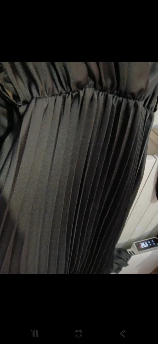 Abito nero plissettato