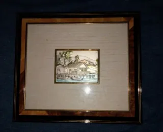 Bassorilievo casa sul lago