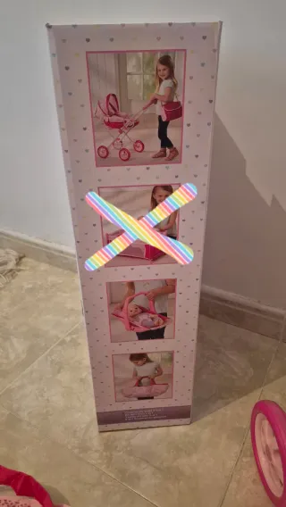 Carrito de bebé y accesorios de juguete