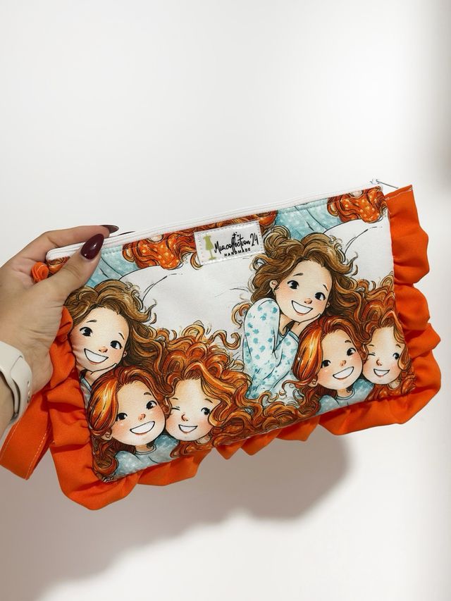 Neceser o cartera de mano.