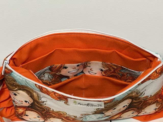 Neceser o cartera de mano.