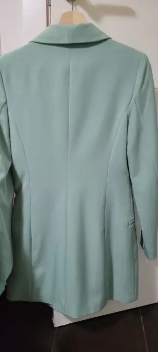 Traje de chaqueta y pantalón verde