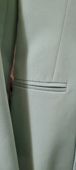 Traje de chaqueta y pantalón verde