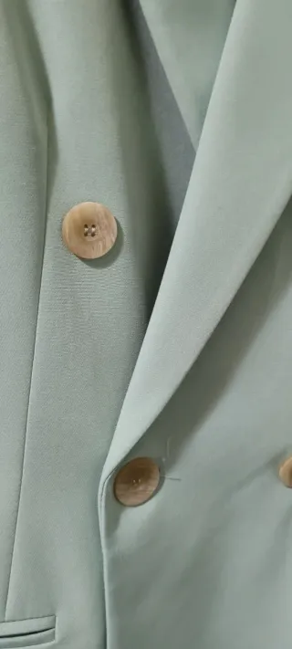 Traje de chaqueta y pantalón verde