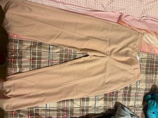 Pantaloni a zampa rosa