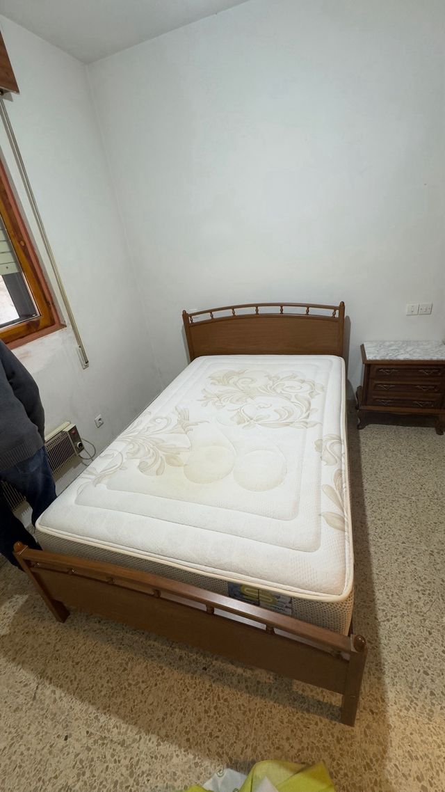 Letto in legno e metallo