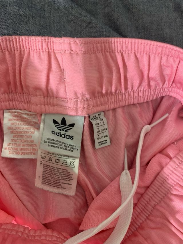 Pantalón chándal Adidas rosa rayas blancas