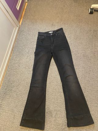 Pantalones campana negros mujer