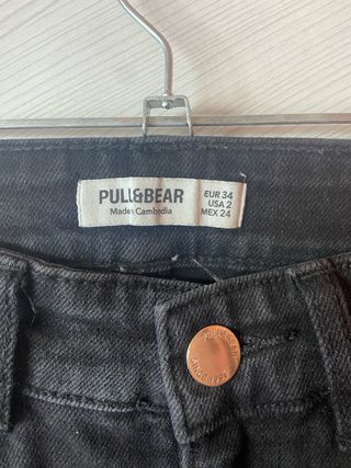 Pantalones campana negros mujer