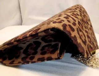 Bolso fiesta animal print dorado