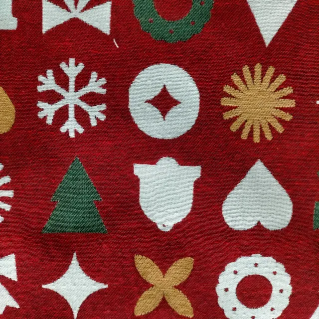 Tela de tapicería con motivos navideños.