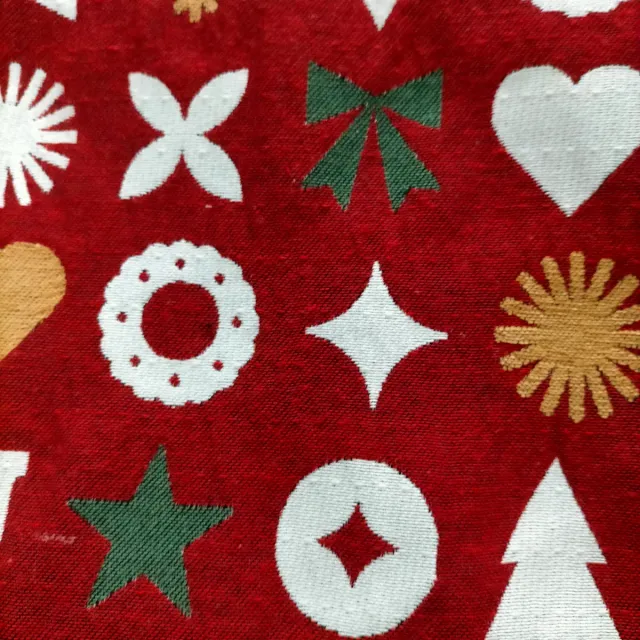 Tela de tapicería con motivos navideños.