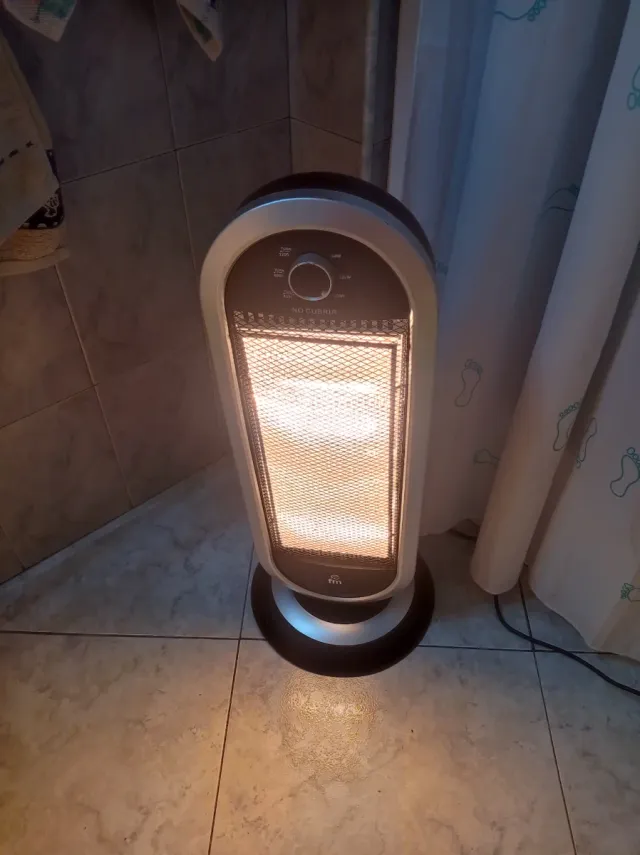 Estufa Falmec Negra y Plateada