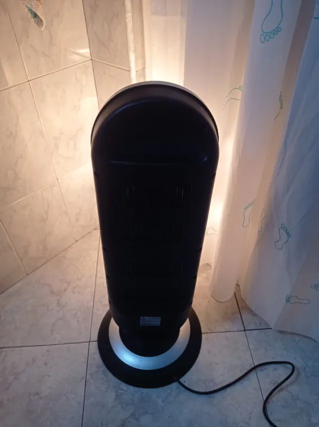 Estufa Falmec Negra y Plateada