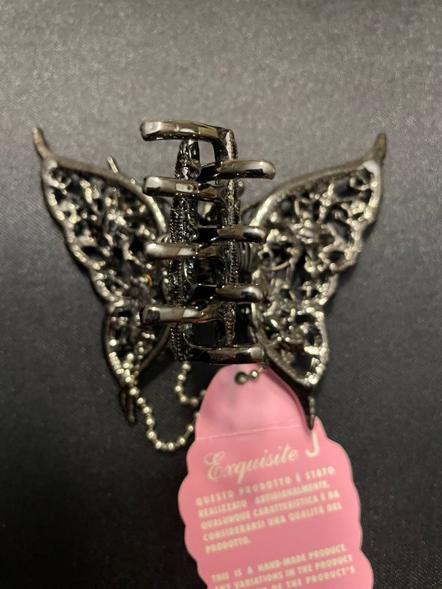 Pinza pelo mariposa oro y verde