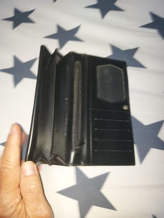 Cartera de mano con monograma