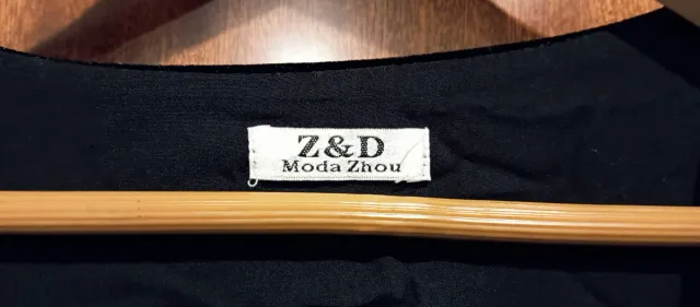 Chaleco negro con brillantes