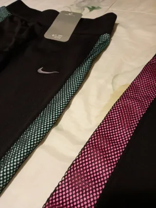 2 Leggings Nike Mujer Negro-Rosa y Negro-Celeste