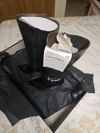 Botas de tacón negras elegantes