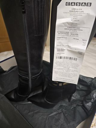 Botas de tacón negras elegantes