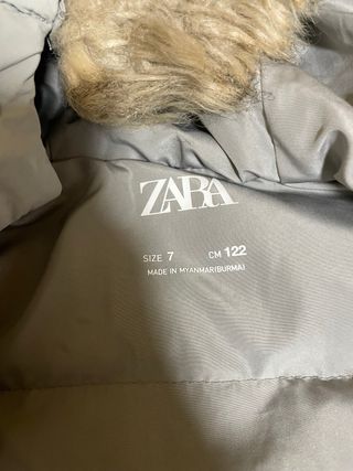 Plumas gris con capucha. talla 7 años