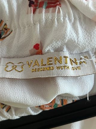 Falda midi plisada estampado figuras