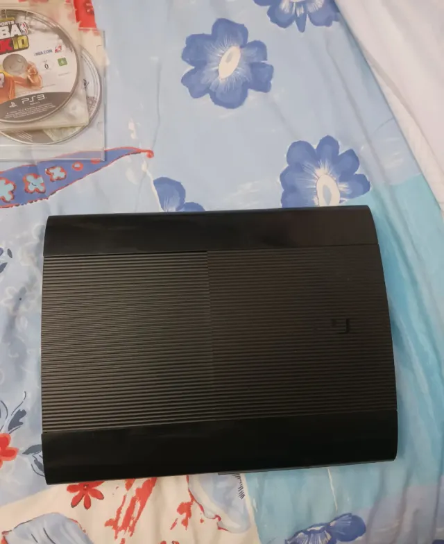 Consola PS3 Super Slim + 5 Juegos