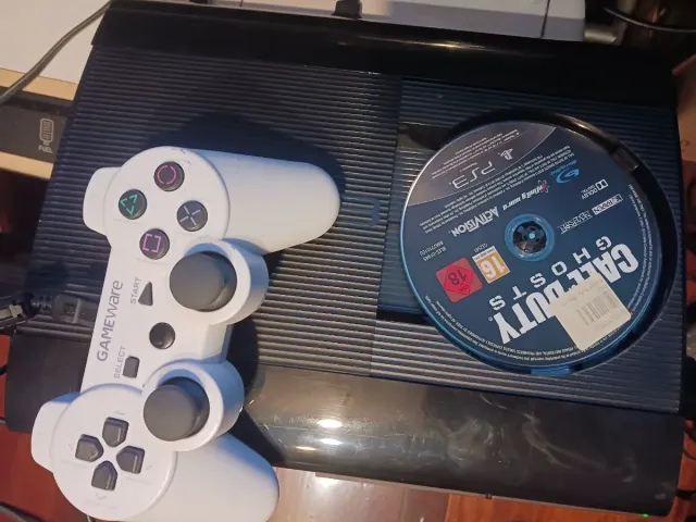 Consola PS3 Super Slim + 5 Juegos