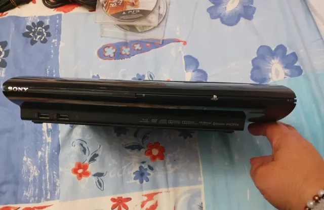 Consola PS3 Super Slim + 5 Juegos