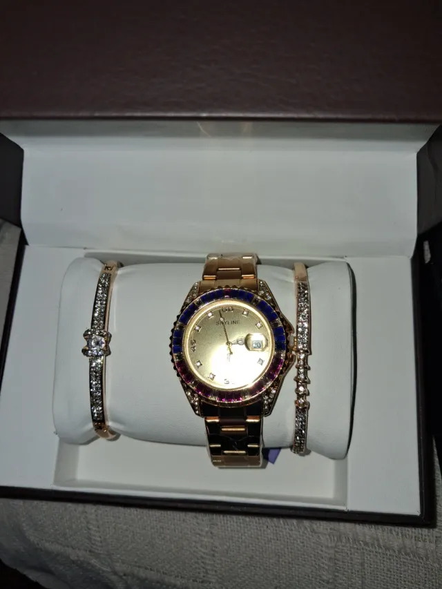 Reloj Skyline Mujer Dorado con Bisel Multicolor