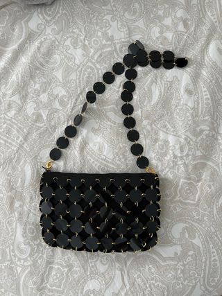 Bolso negro y dorado con lentejuelas