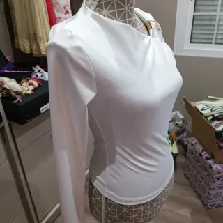 Top hebilla asimétrico