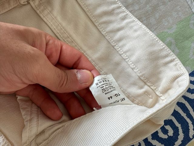 Jeans beige strappati